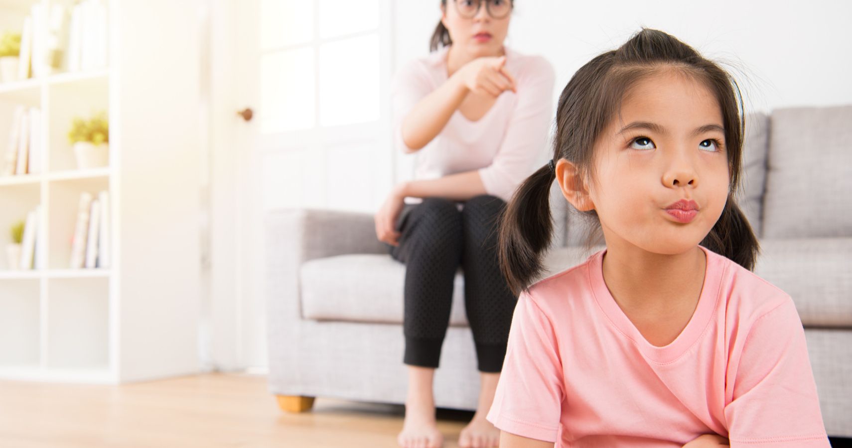 child talking back at mom pointing