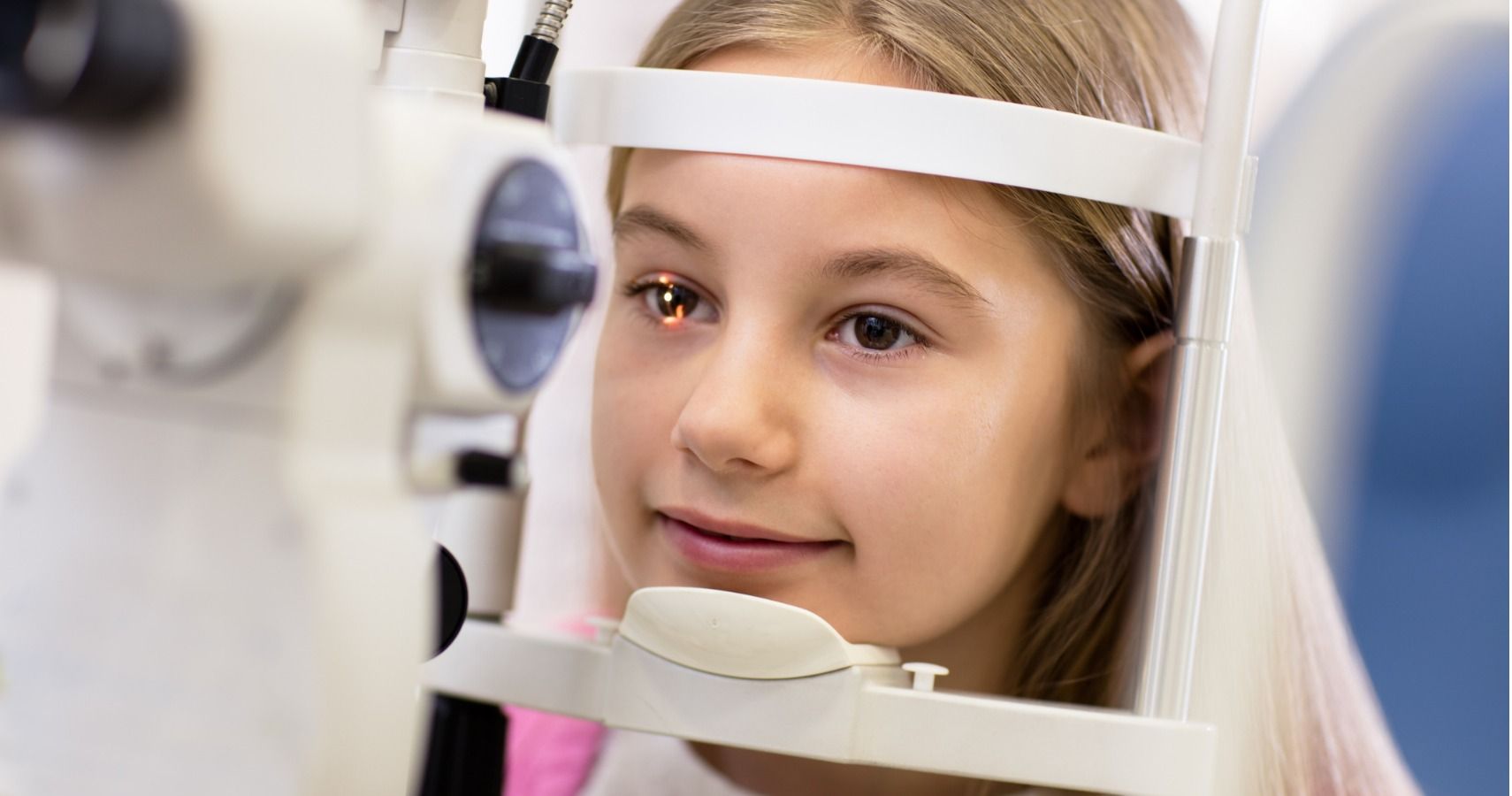 child at eye doctor