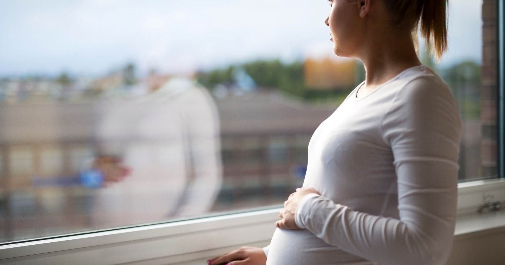 woman pregnant worried
