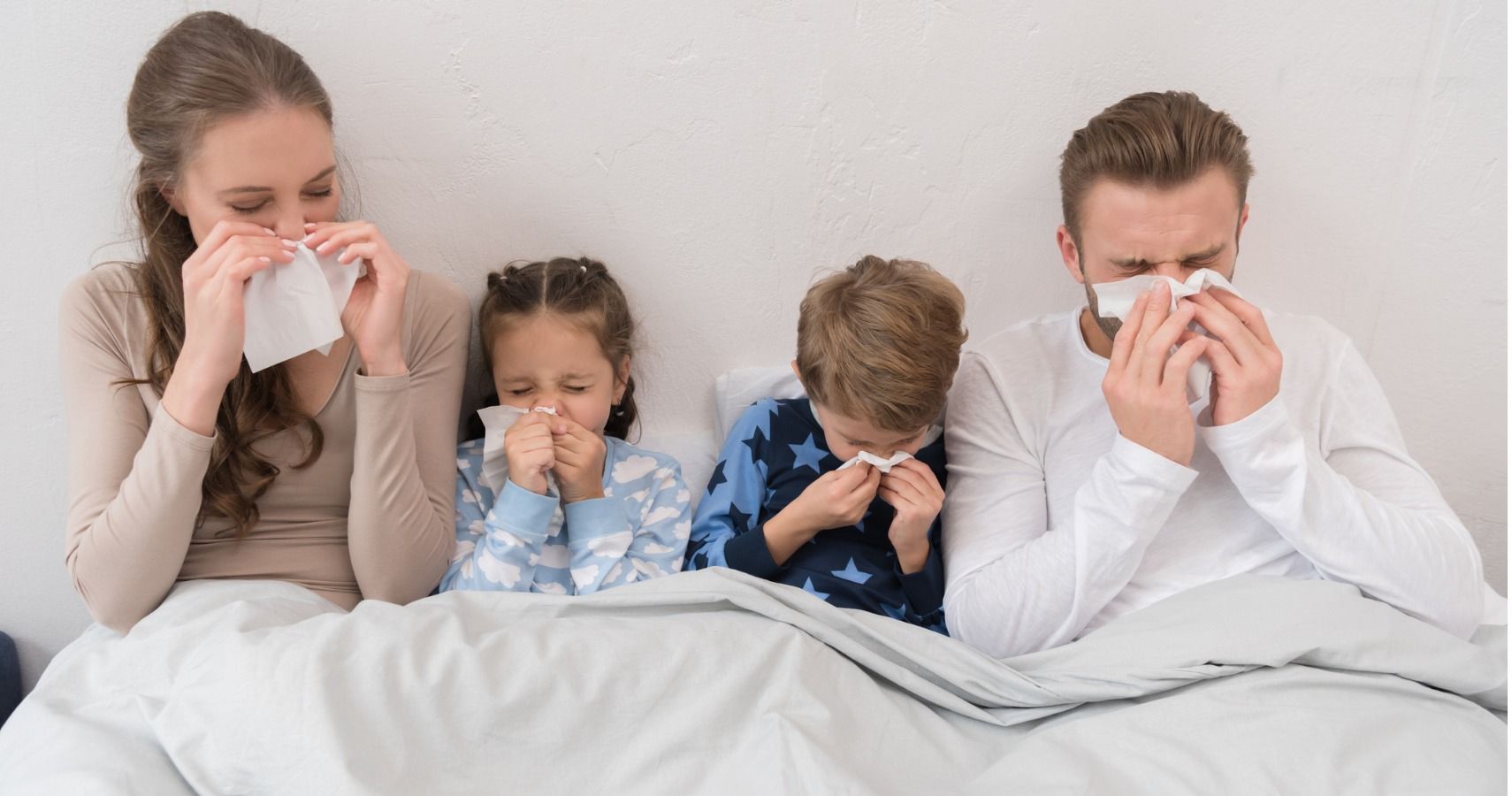 family sick in bed cold