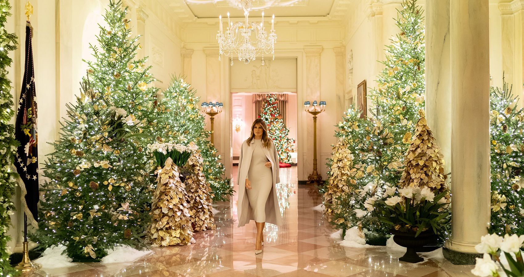 Melania Trump with Christmas trees in the White House