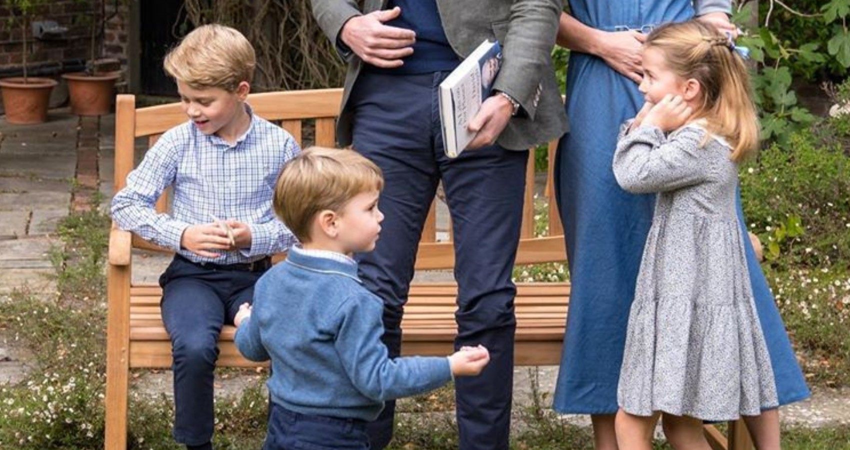 The royal children looking at someone