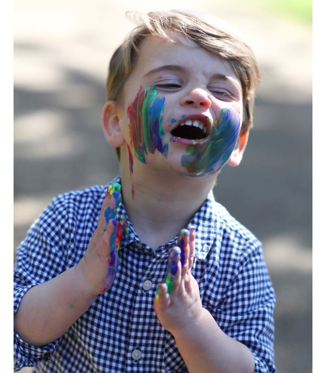 A picture of Prince Louis with paint all over his face