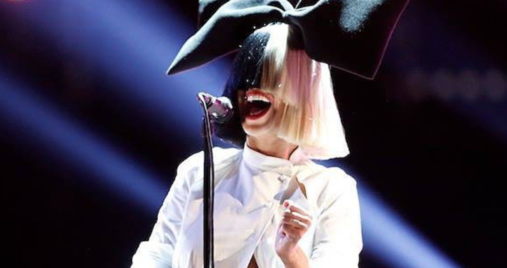 Sia performing live on stage