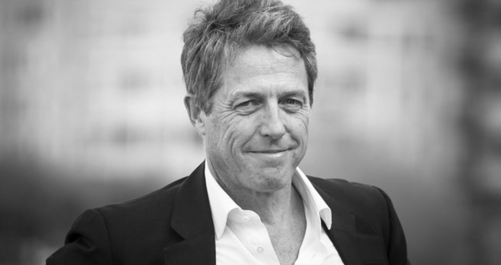 A picture of Hugh Grant in black and white