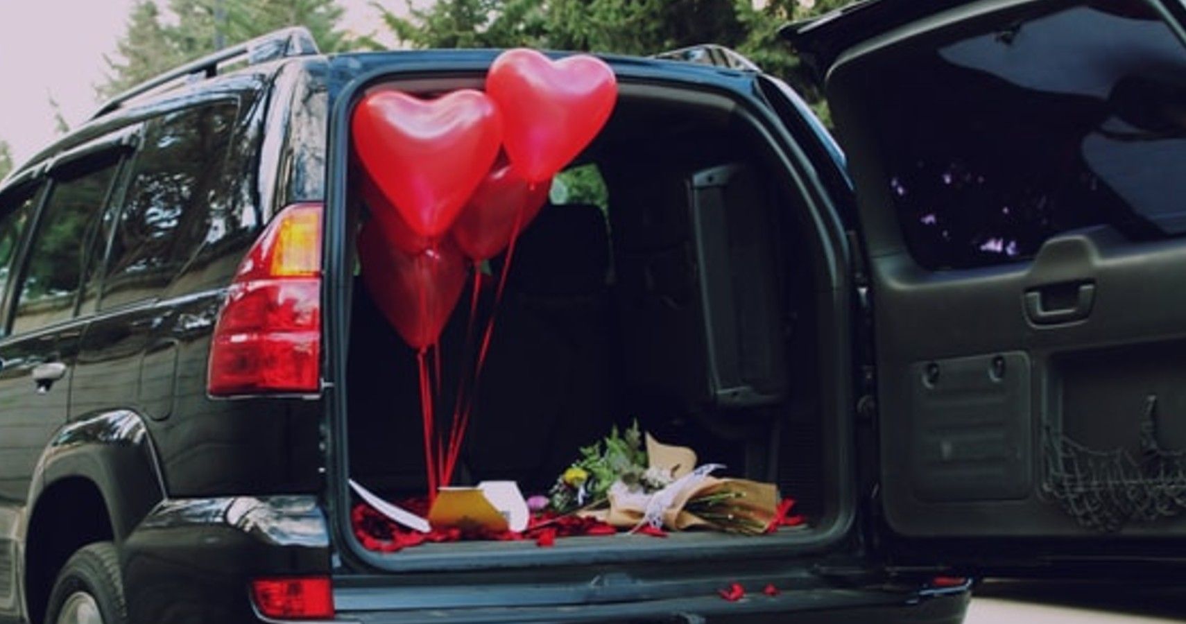 vehicle with balloons in it