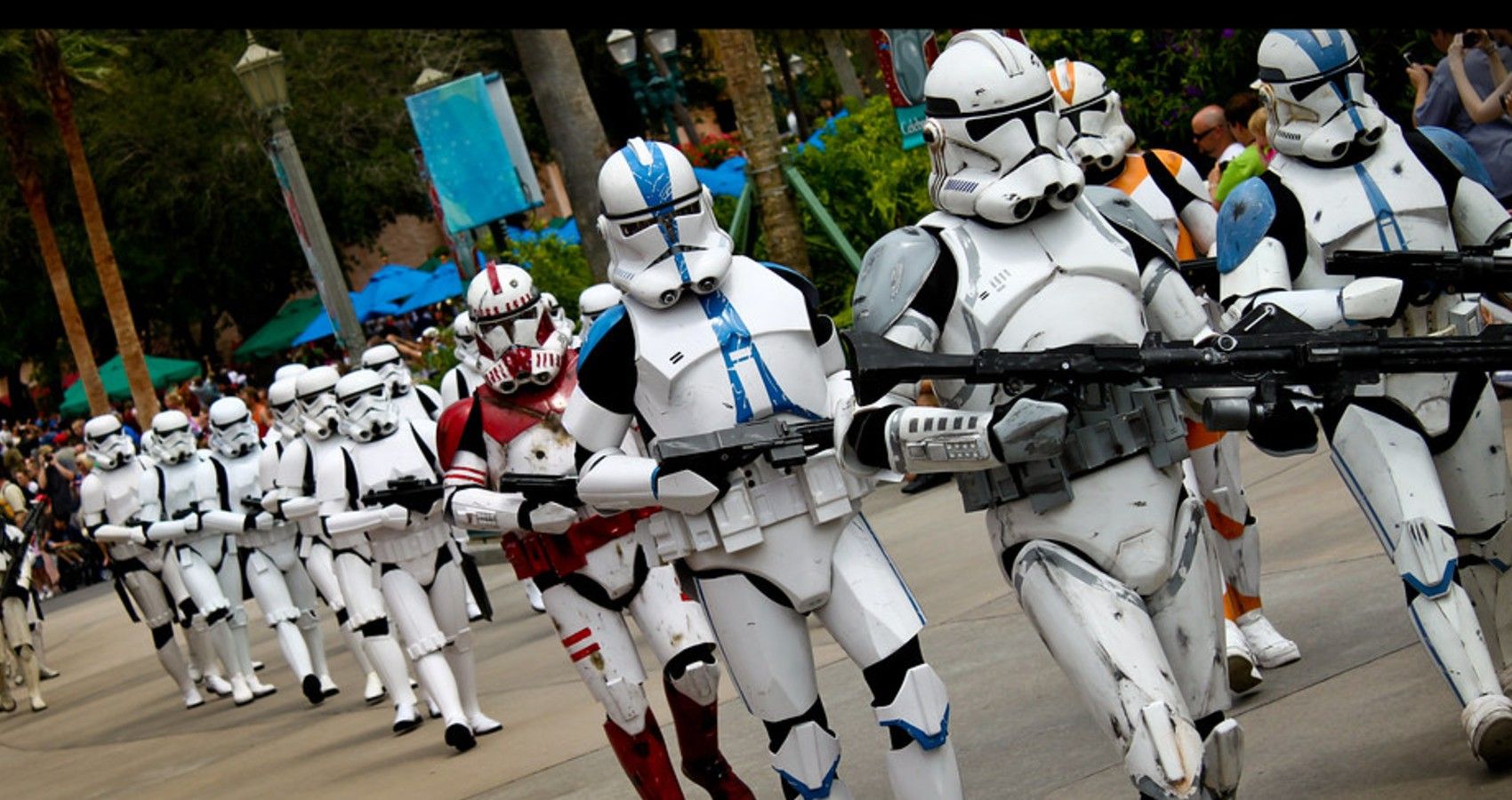 A parade of storm troopers walking outside