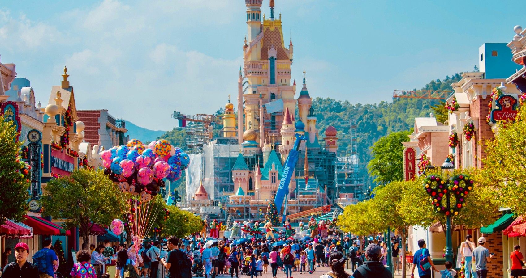 A view of the Disneyland castle and guests