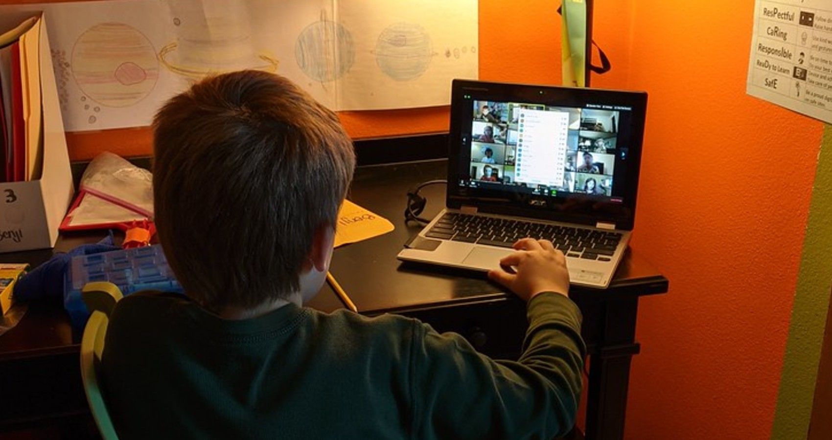 A child doing remote learning on laptop
