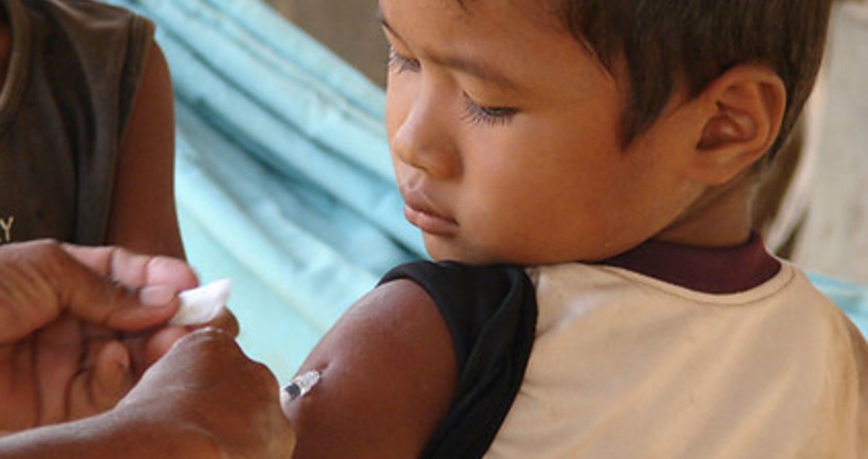 A child receiving the measles vaccine
