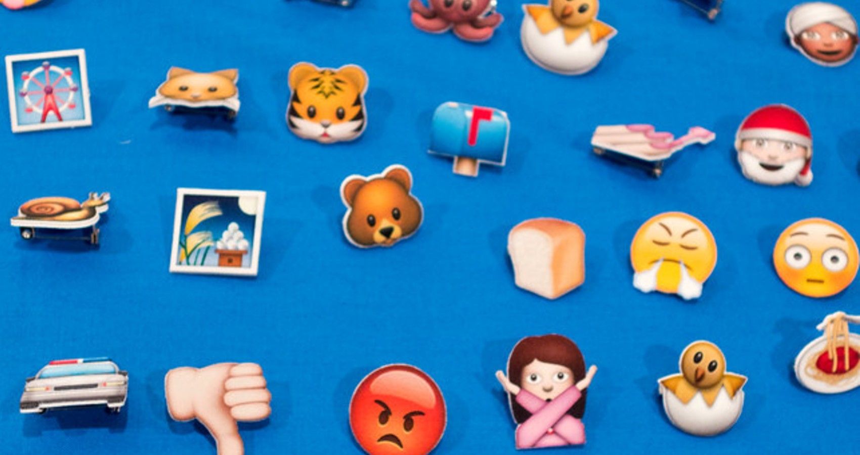 A collection of emojis on a blue background