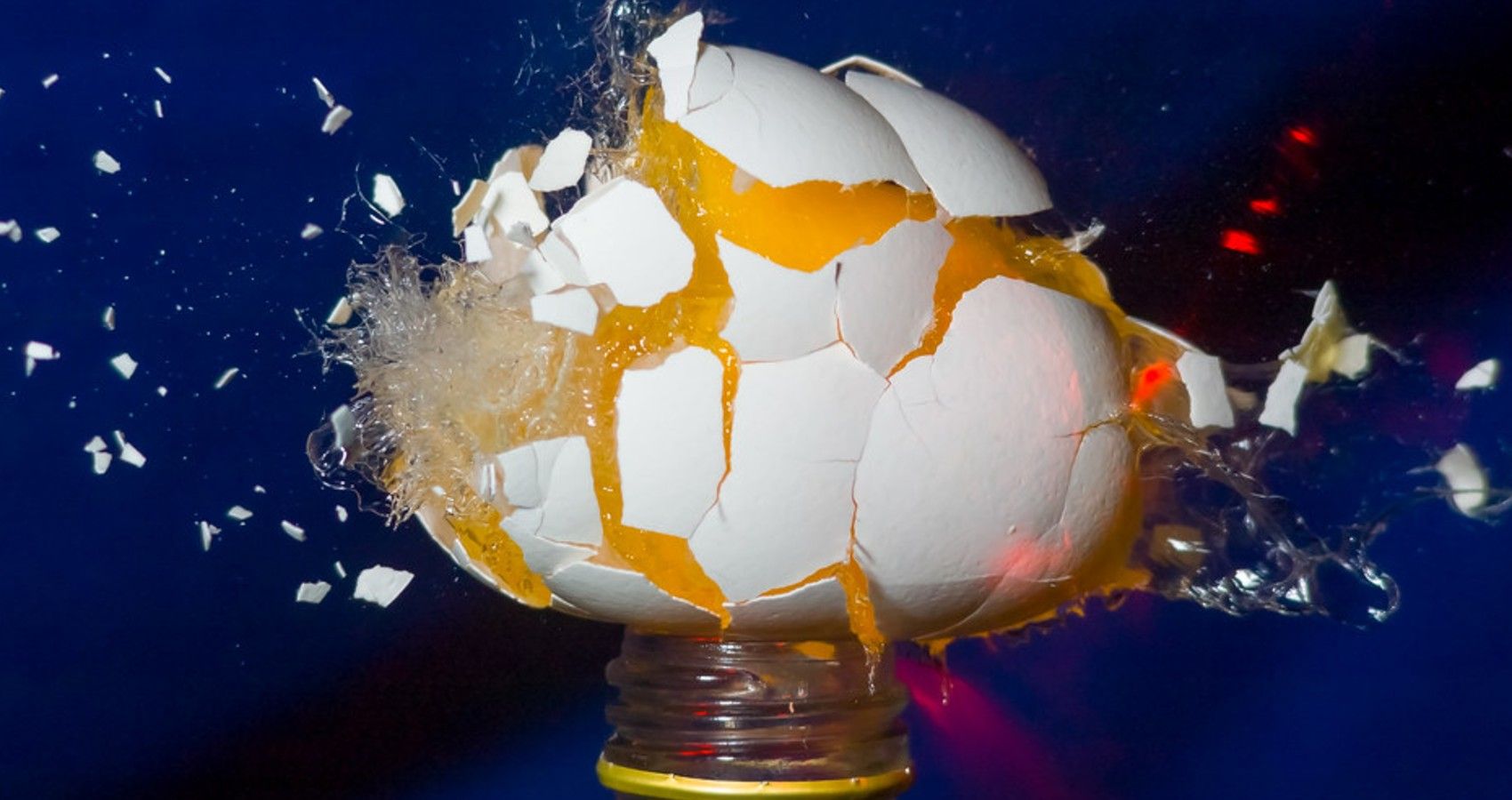 An egg getting shot and exploding
