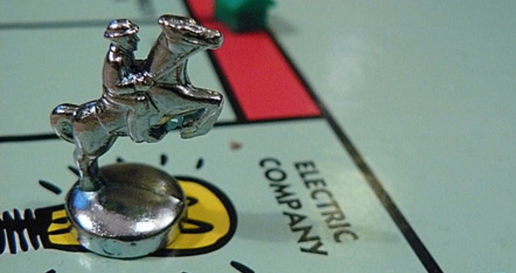 A close up of a monopoly board