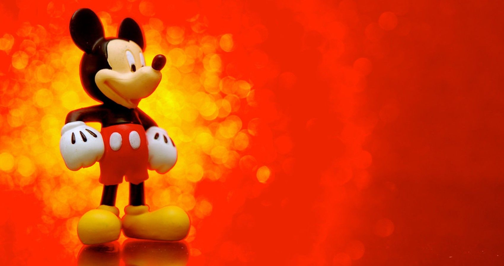 A mickey mouse on a red background