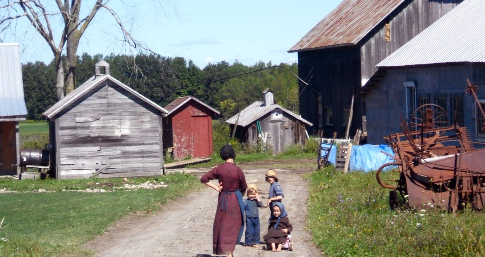 A mother and her children at theri farm