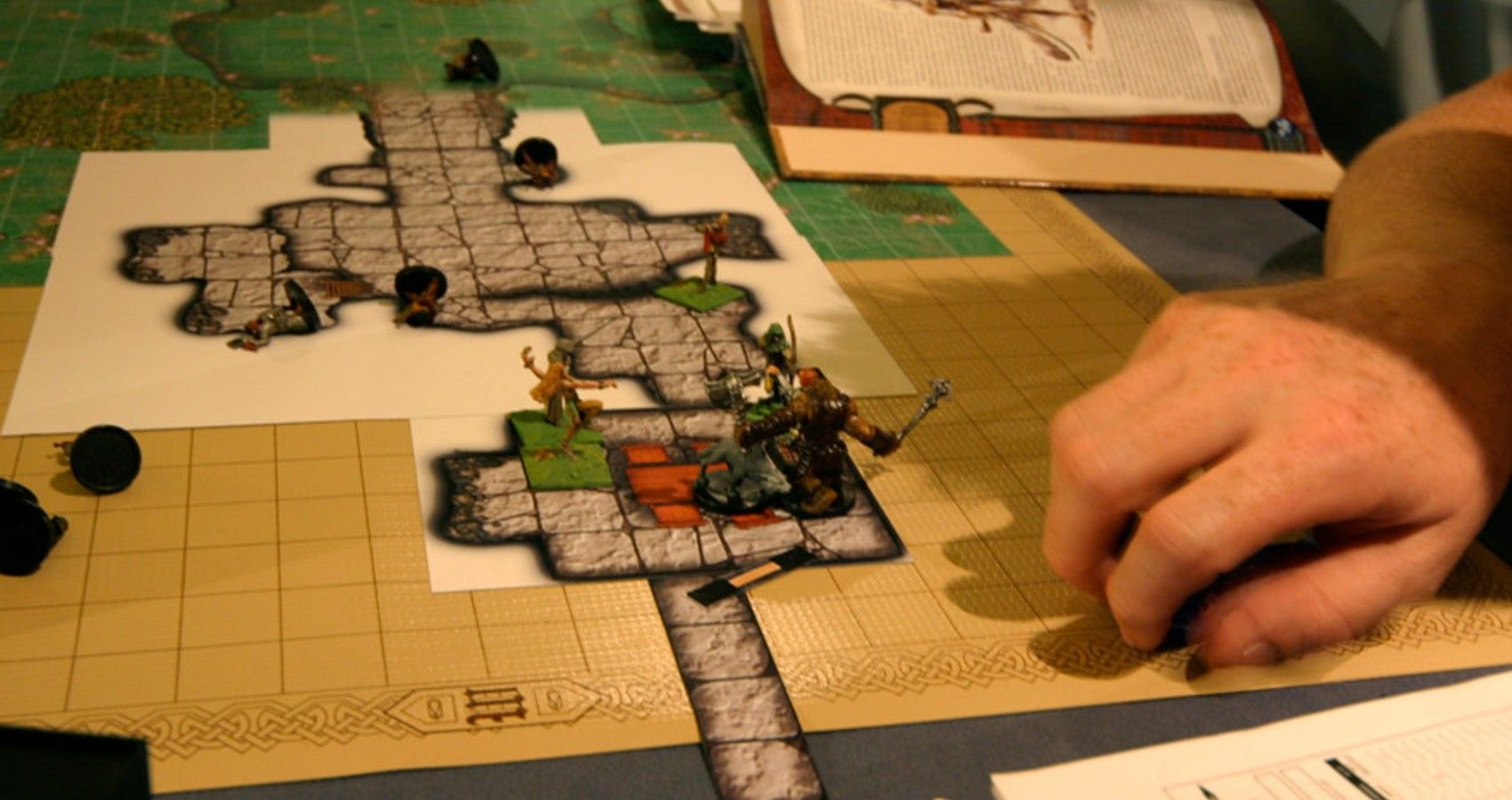 People Playing Dungeons And Dragons Together At A Table