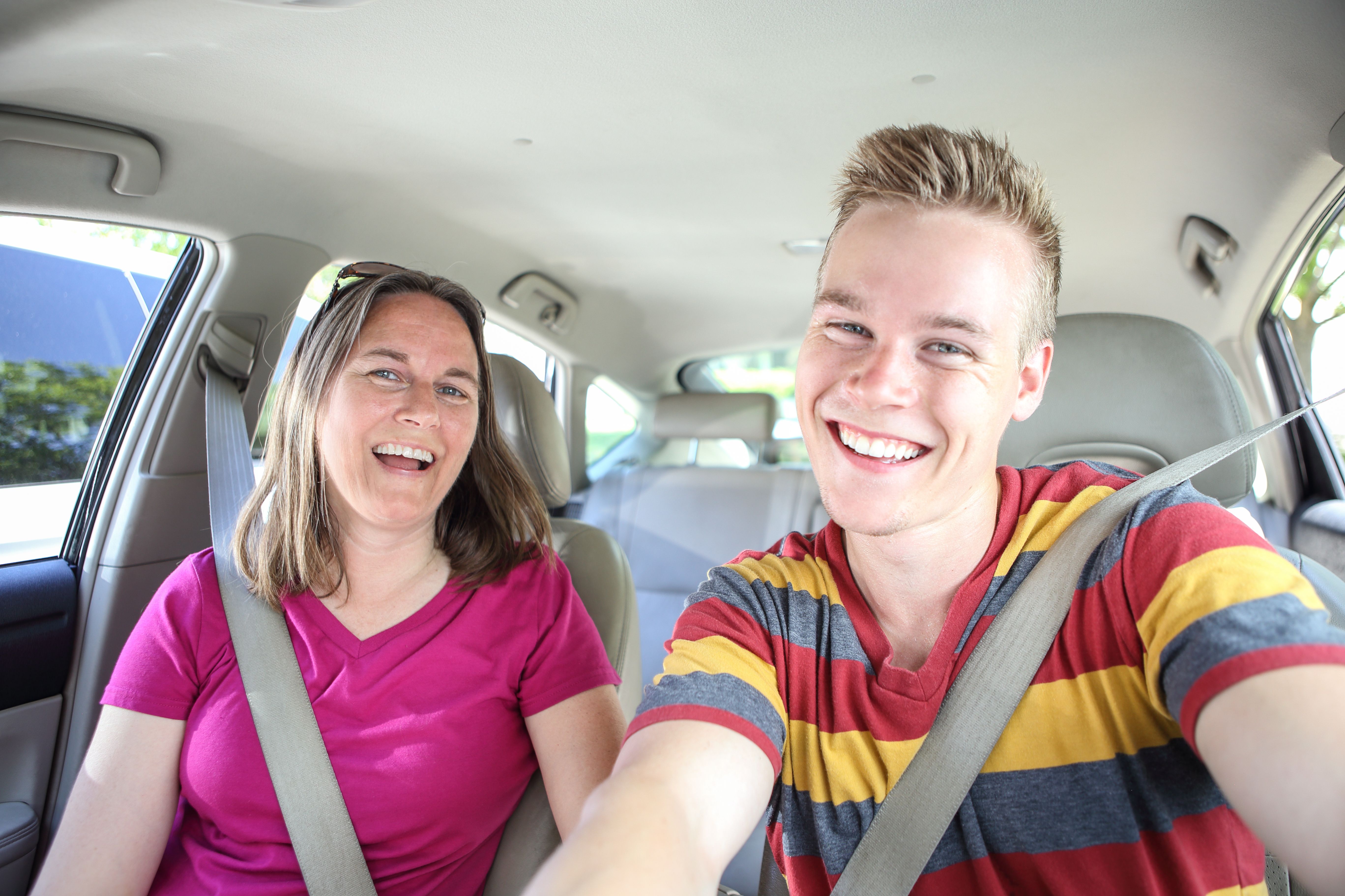 mom in car with teen boy