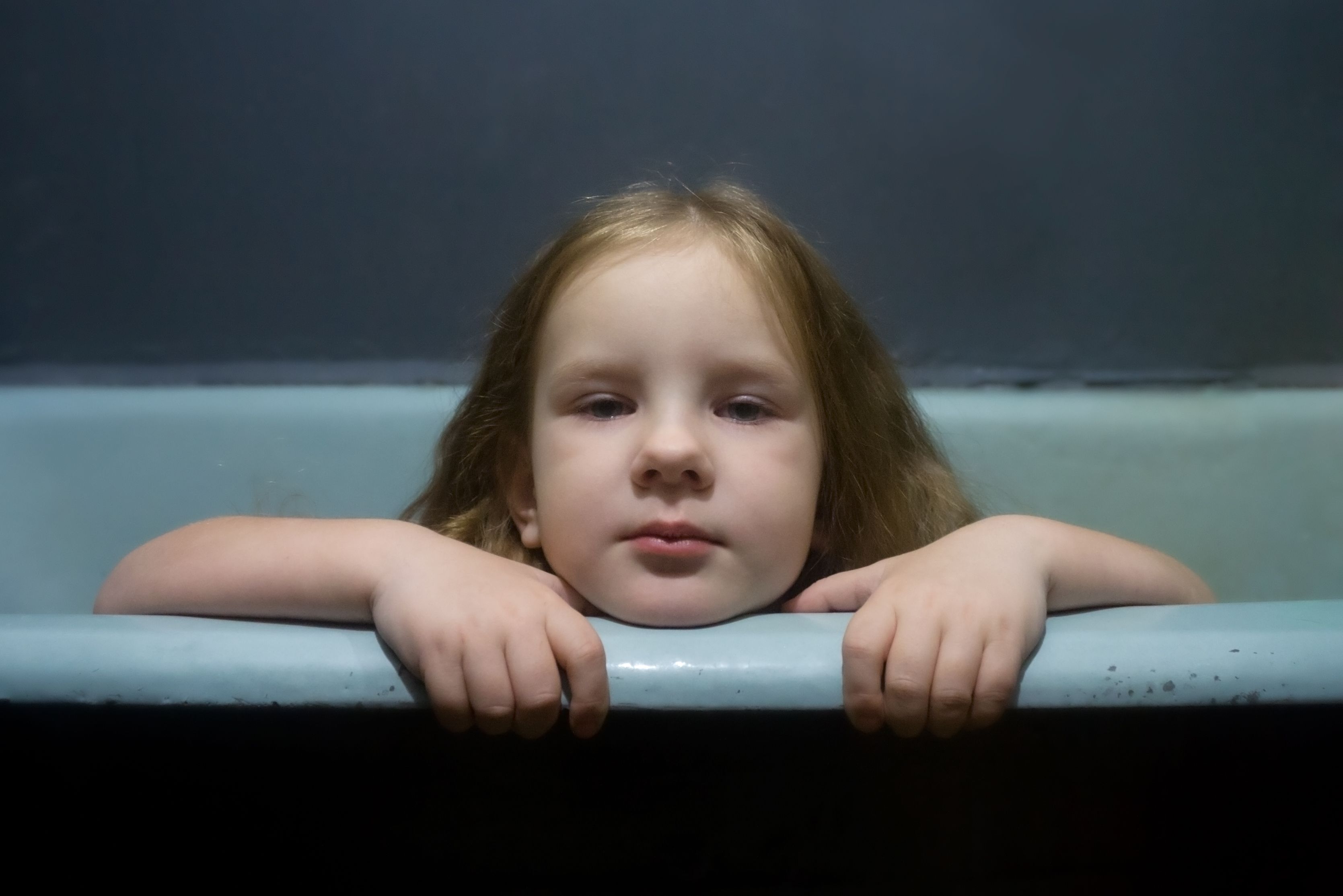 little girl in tub