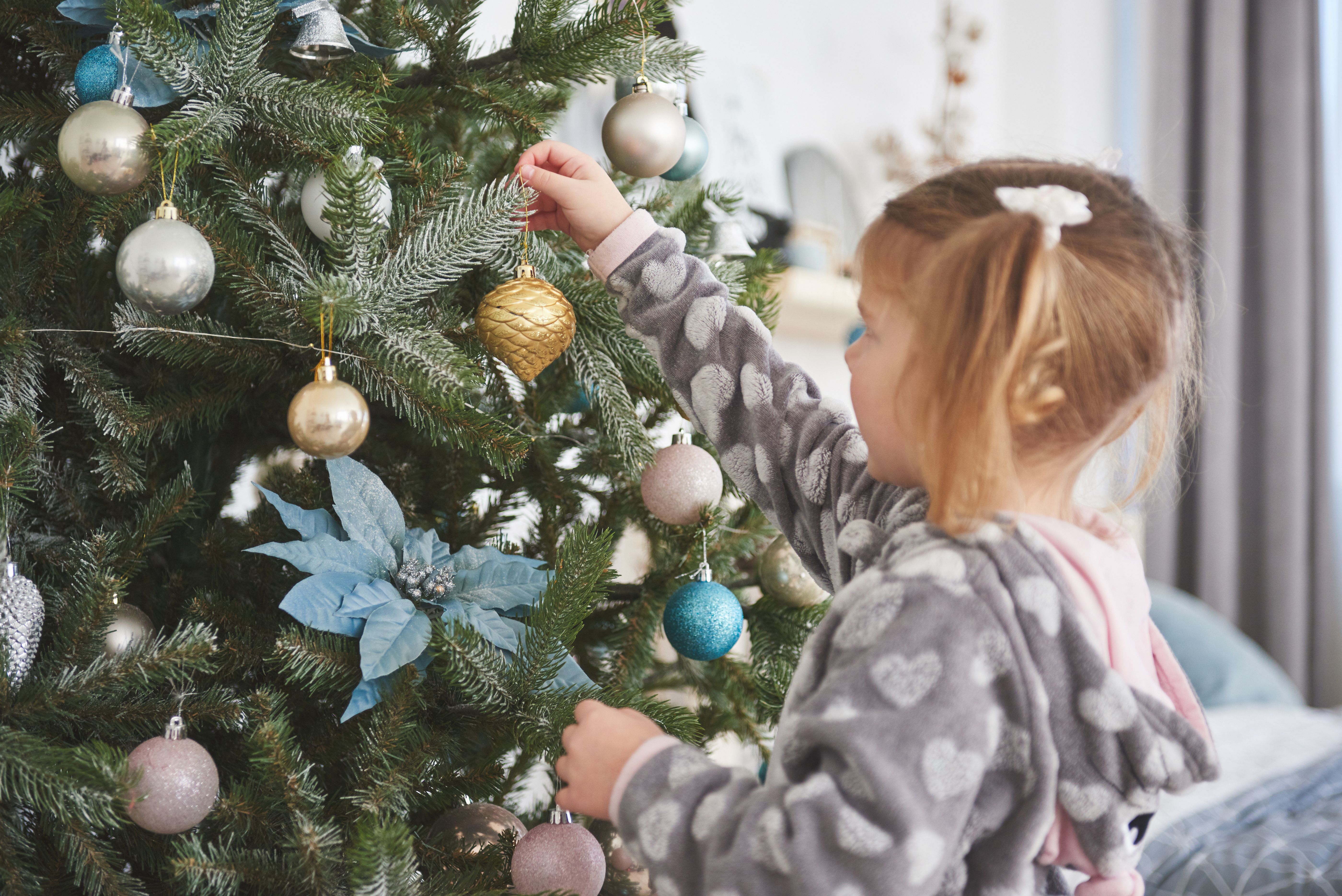 toddler hanging Christmas tree ornament