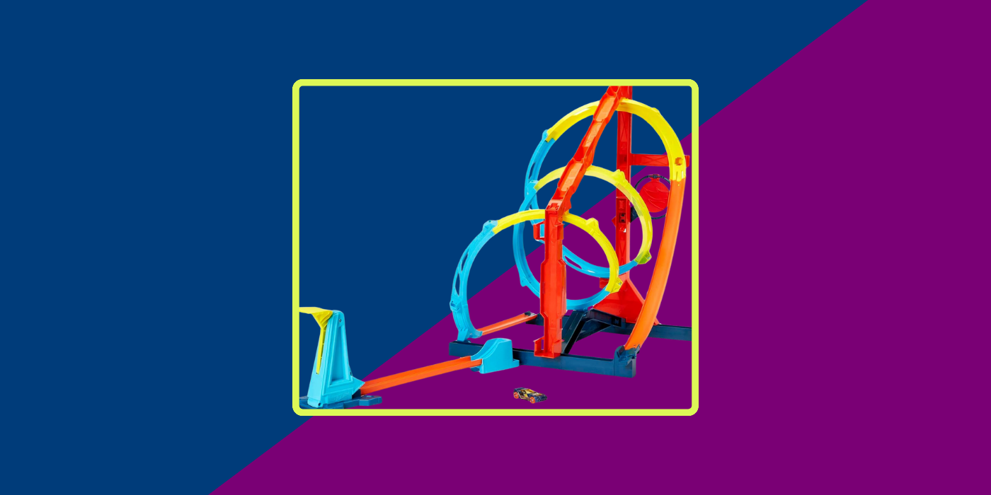 purple and blue background with a blue and yellow hot wheels track