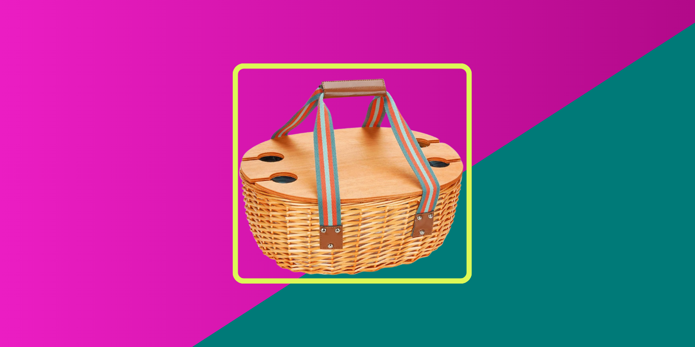 purple and green background with a wicker picnic basket